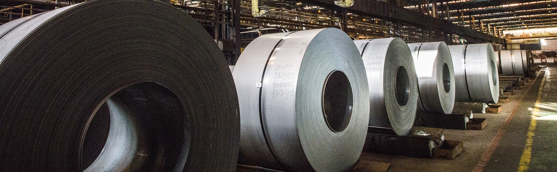 rolls of aluminum coil in a warehouse