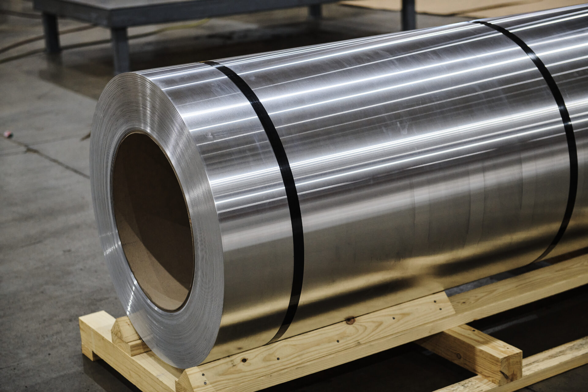 roll of banded aluminum coil on a pallet